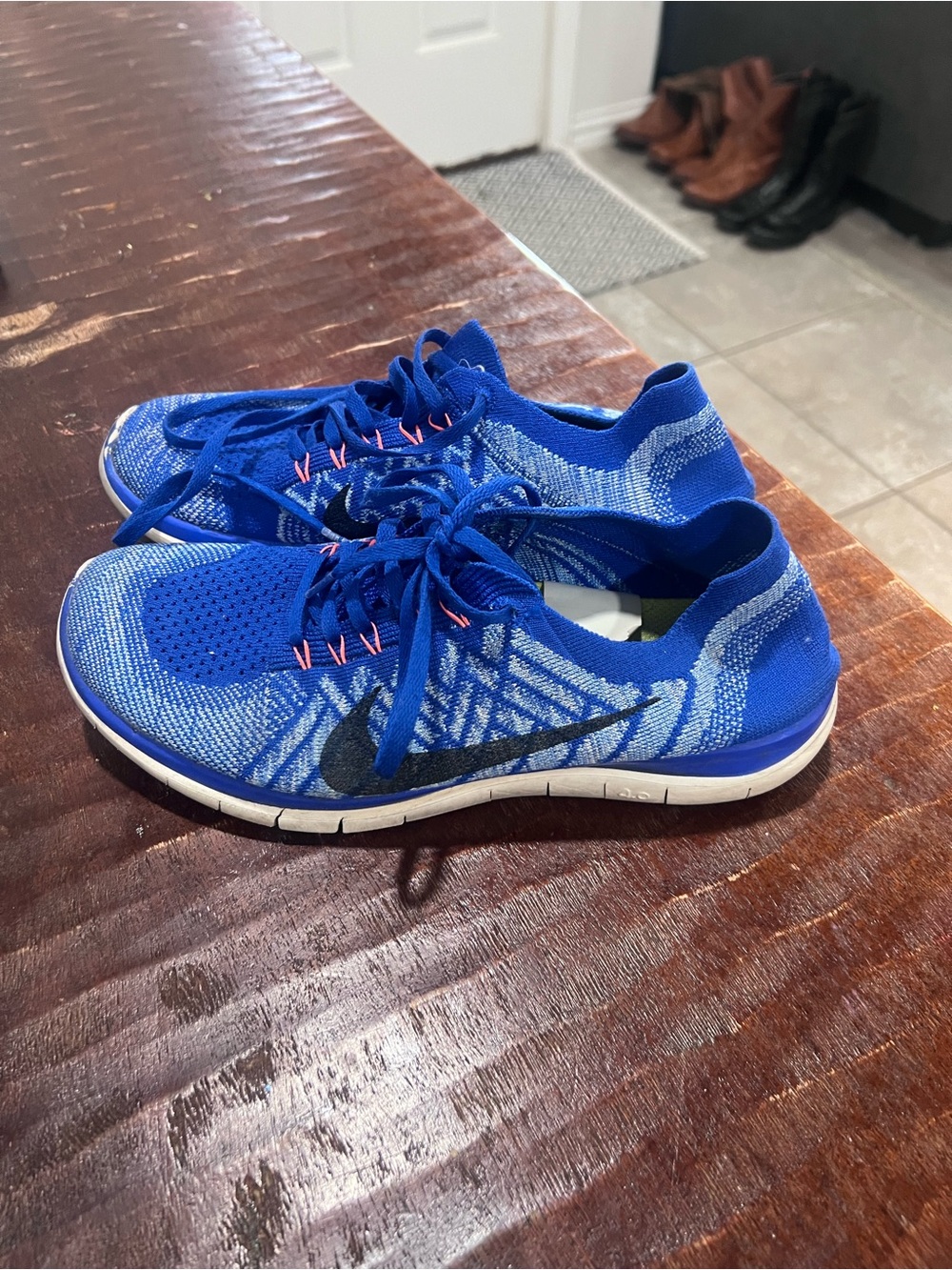 Nike Blue Knit Running Sneakers with Black Swoosh and Pink Accents